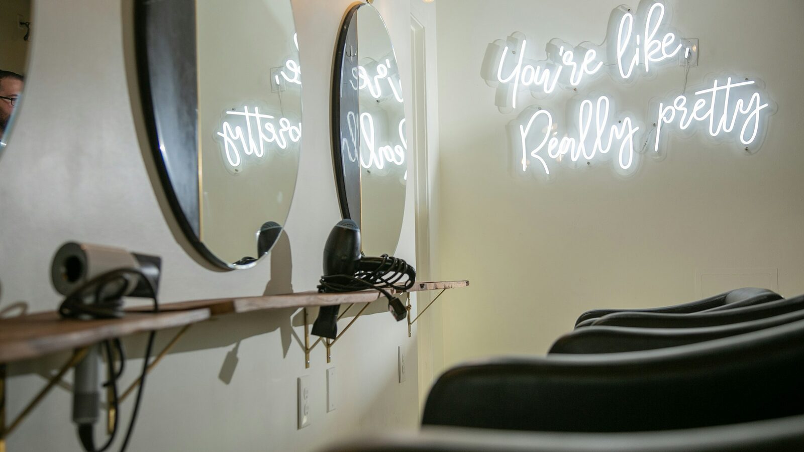 Modern salon interior with styling chairs and mirrors